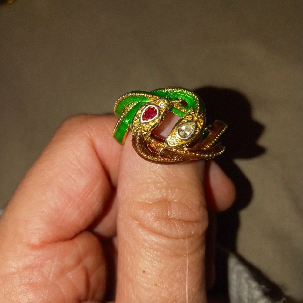 Elegant Gold Snake Ring with Green and Red Accents